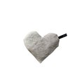Small heart-shaped warming pillow in lightbrown color